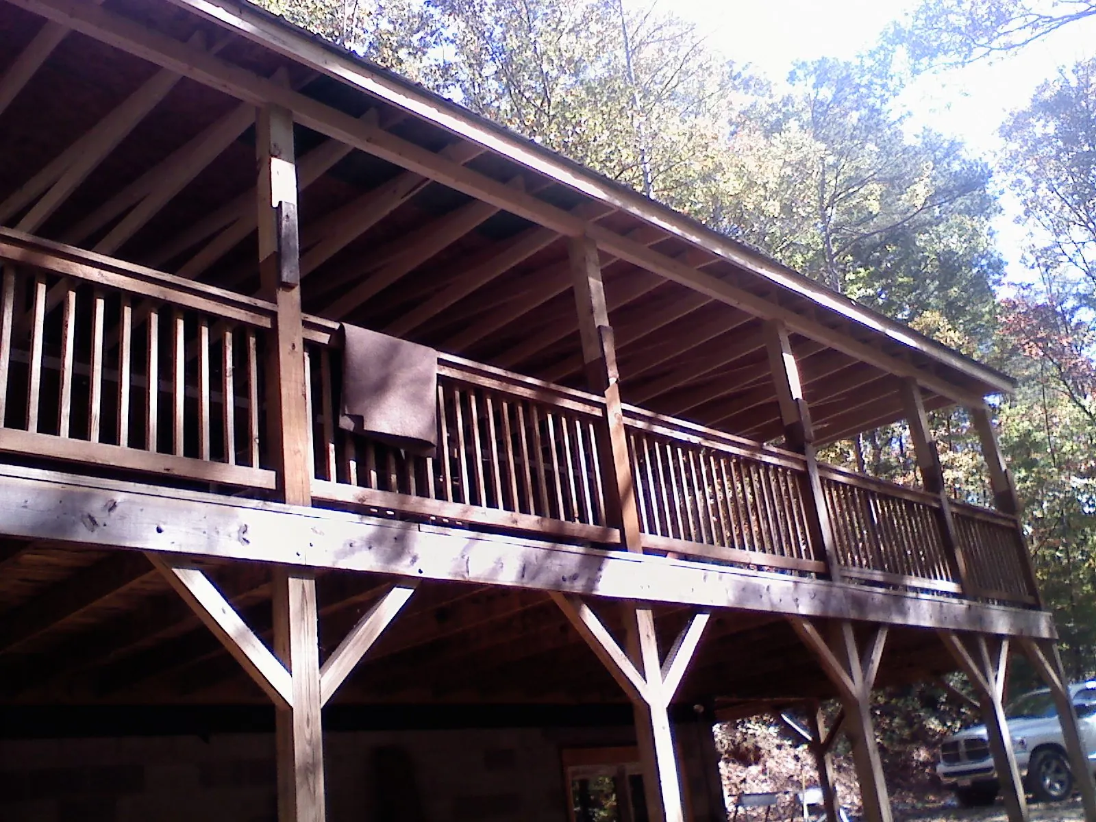 Timber framing under a new elevated porch and deck — Roof Leak Repair in Todd by Roofing Brothers
